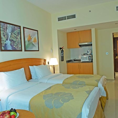 Golden Tulip Sharjah Aparthotel Luaran gambar