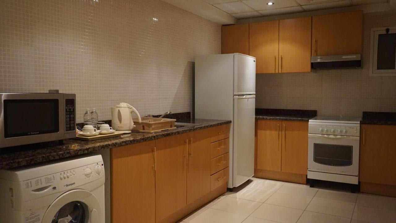 Golden Tulip Sharjah Aparthotel Luaran gambar