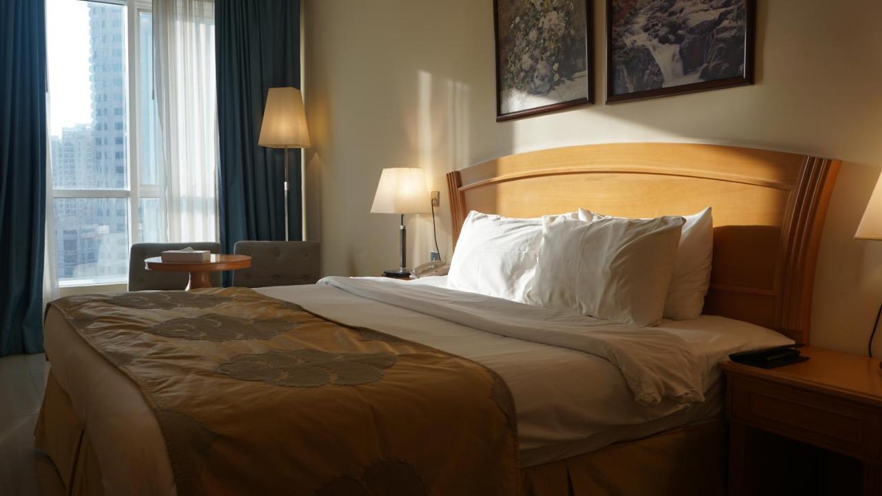 Golden Tulip Sharjah Aparthotel Luaran gambar